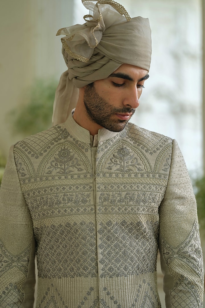 Olive Green Raw Silk Floral Embroidered Groom Sherwani Set by Amrit Dawani at Pernia's Pop Up Shop