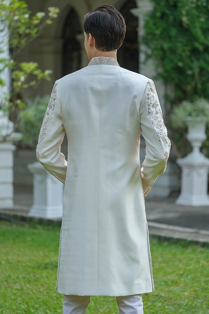 Peach Pink Dupion Silk Floral Hand Embroidered Groom Sherwani Set by Amrit Dawani at Pernia's Pop Up Shop