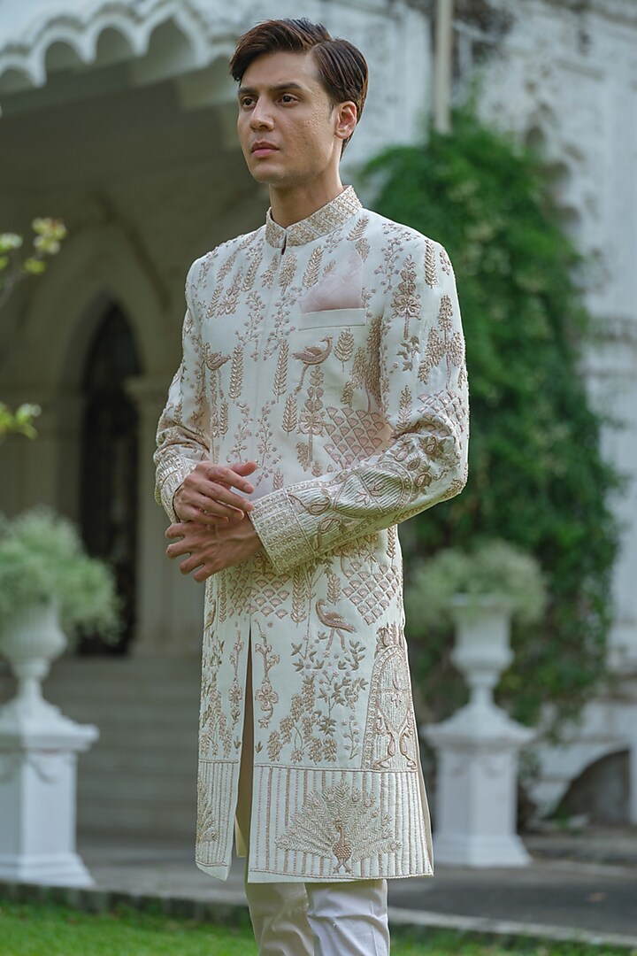 Peach Pink Dupion Silk Floral Hand Embroidered Groom Sherwani Set by Amrit Dawani at Pernia's Pop Up Shop