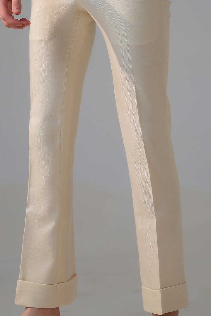 Ivory Herringbone Trousers by Amrit Dawani at Pernia's Pop Up Shop