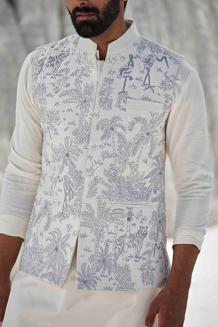 Ivory Raw Silk Thread Embroidered Bundi Jacket Set by Amrit Dawani at Pernia's Pop Up Shop