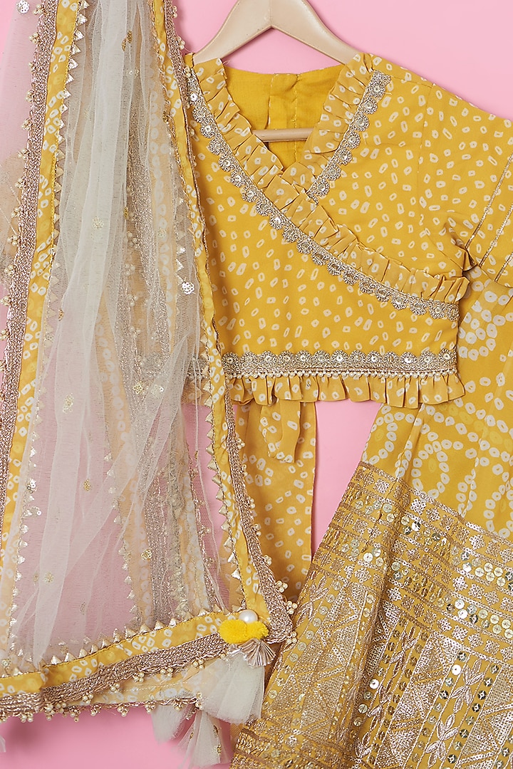 Yellow Georgette Bandhej Lehenga Set For Girls by ATIJAH at Pernia's Pop Up Shop