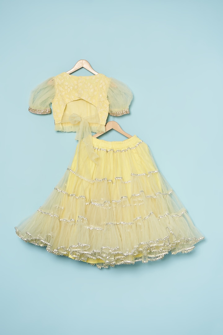 Yellow Net Layered Lehenga Set For Girls by ATIJAH at Pernia's Pop Up Shop