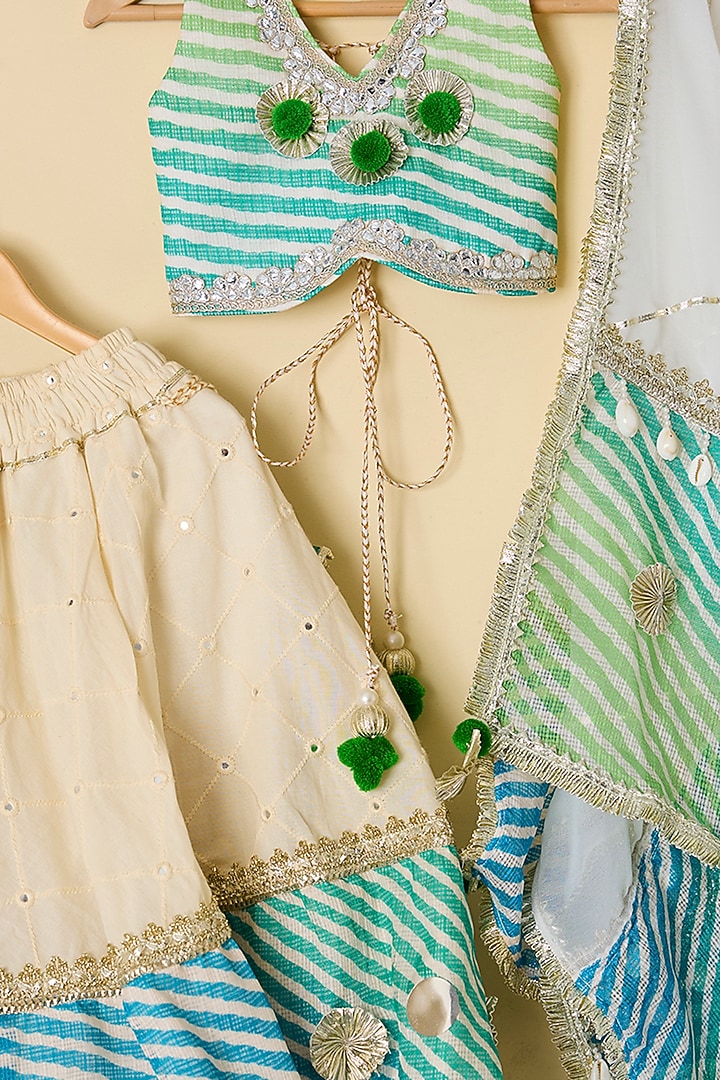 Off-White & Blue Cotton Mirror Embroidered Leheriya Lehenga Set For Girls by ATIJAH at Pernia's Pop Up Shop