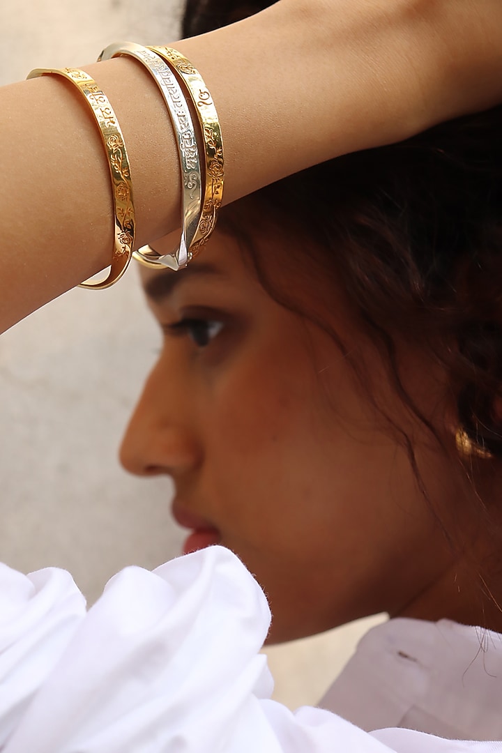 Gold Finish Gayatri Mantra Bangle In Sterling Silver by Eina Ahluwalia at Pernia's Pop Up Shop