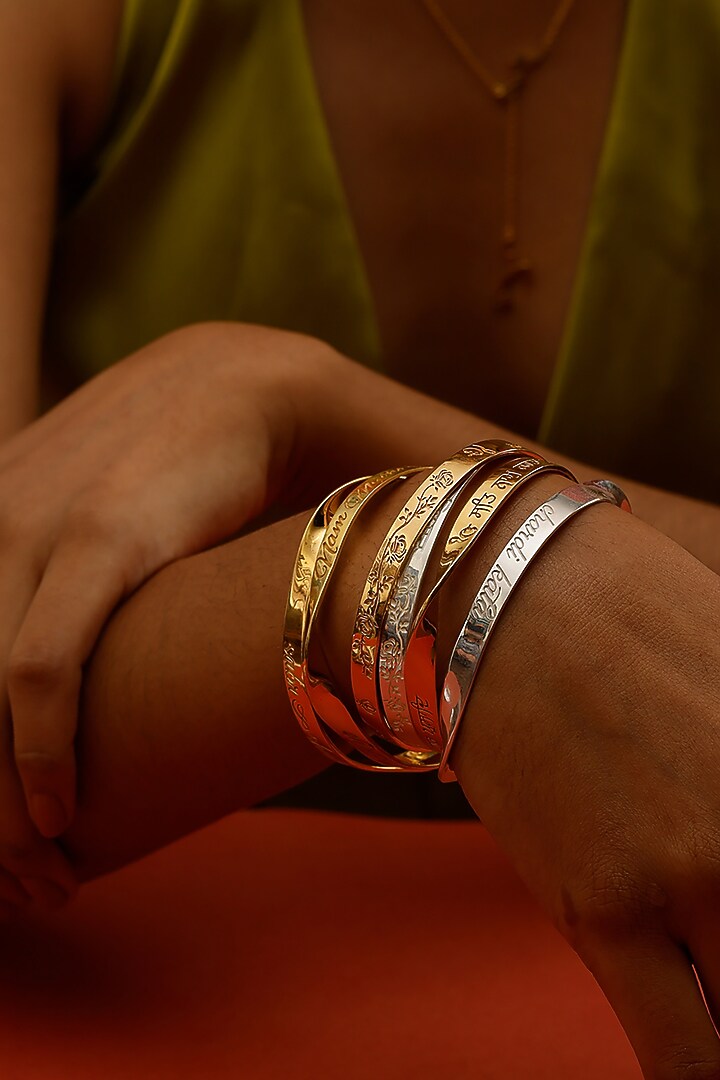Gold Finish Japji Sahib Mool Mantar Bangle In Sterling Silver by Eina Ahluwalia at Pernia's Pop Up Shop