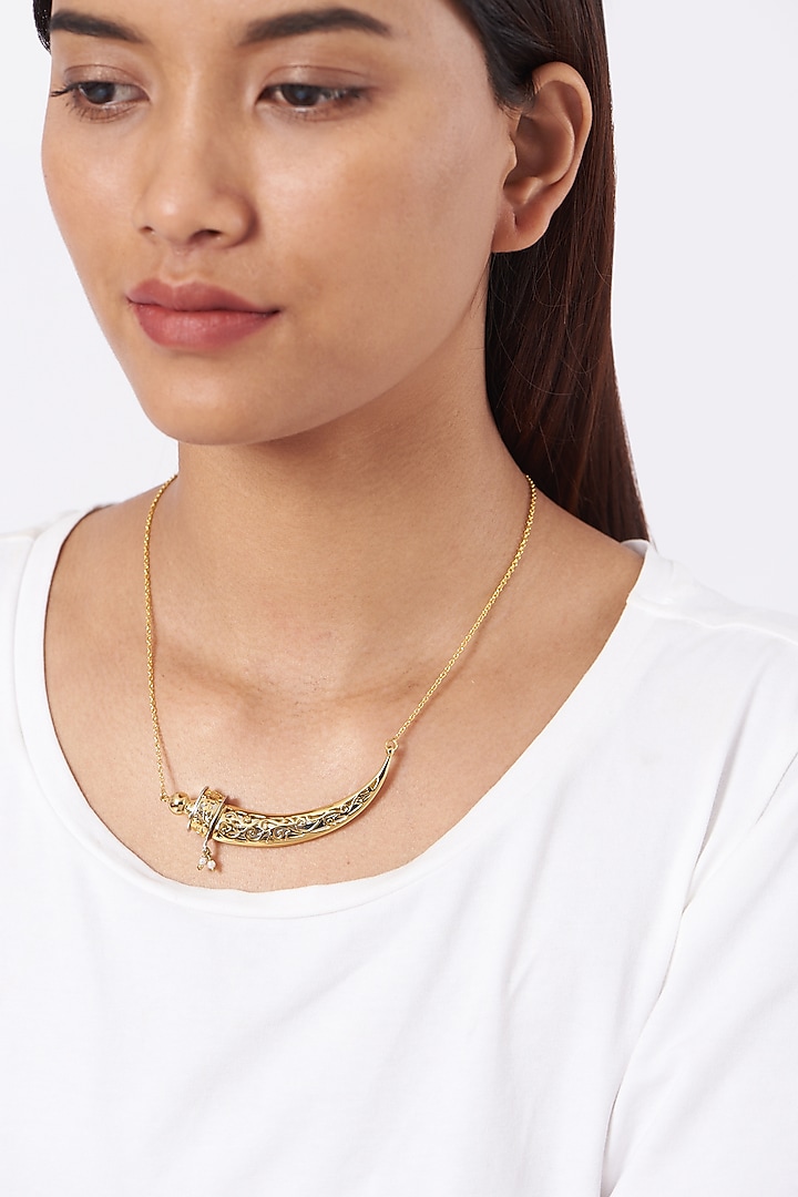 Gold Finish Mini Kirpan Necklace In Sterling Silver by Eina Ahluwalia at Pernia's Pop Up Shop