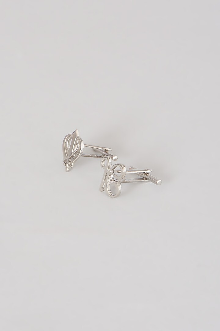 White Finish Ik Onkar Khanda Cufflinks In Sterling Silver by Eina Ahluwalia at Pernia's Pop Up Shop