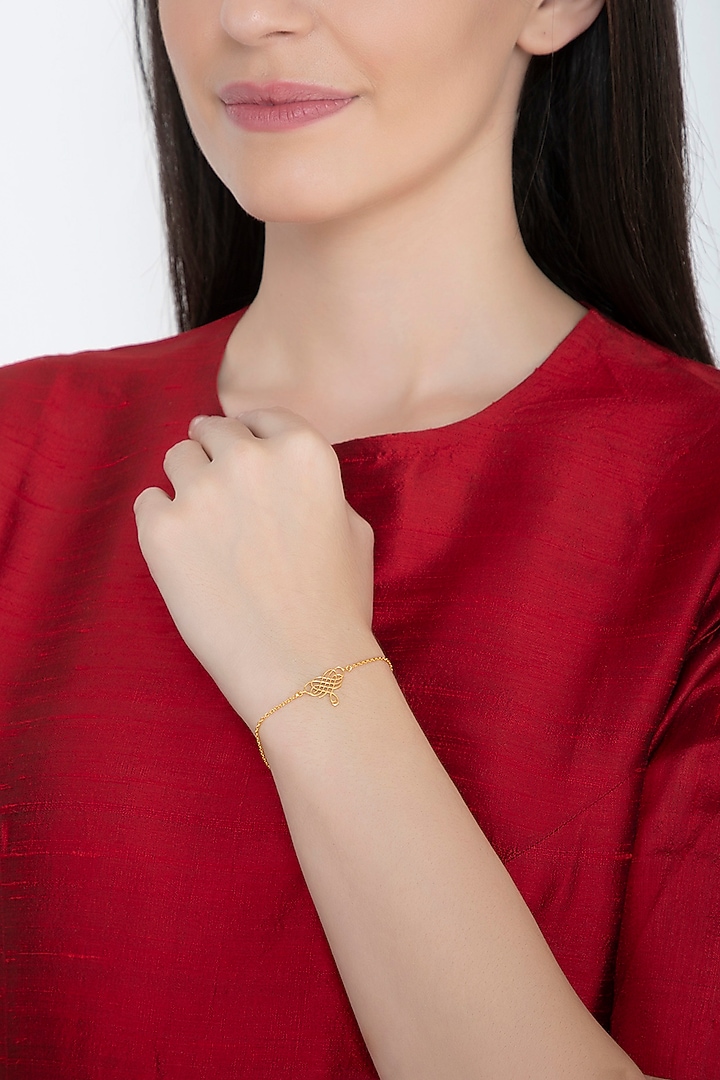 Gold Finish Heart Bracelet by Eina Ahluwalia at Pernia's Pop Up Shop