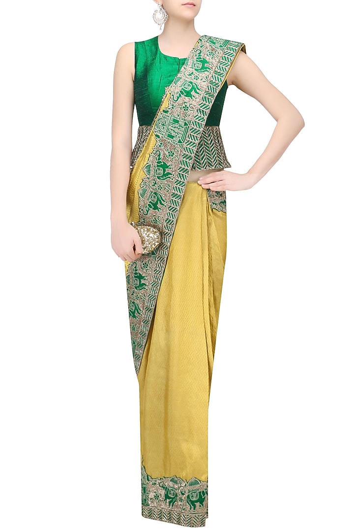 Gold elephants embroidered saree with green jacket blouse available only at Pernia's Pop Up Shop.