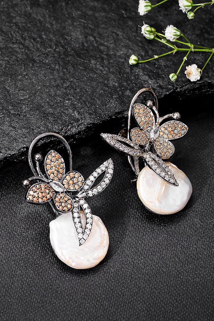 Black Rhodium Finish Coral Diamond & Baroque Pearl Butterfly Stud Earrings by Autumn Poppy at Pernia's Pop Up Shop