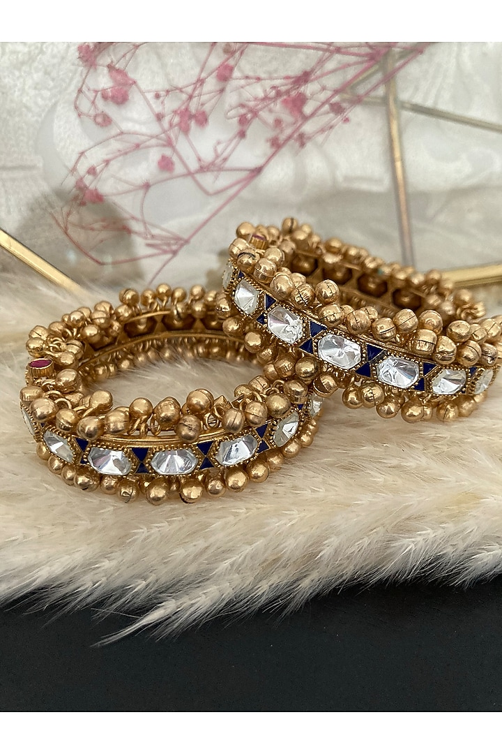 Gold Plated Kundan Polki & Blue Stone Bangles (Set Of 2) by Autumn Poppy at Pernia's Pop Up Shop