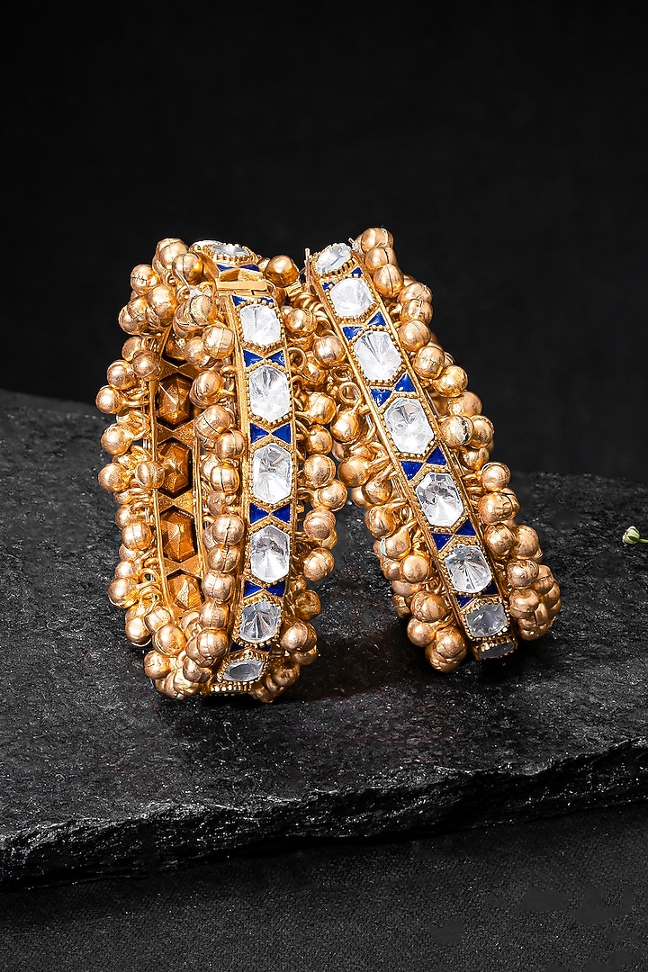 Gold Plated Kundan Polki & Blue Stone Bangles (Set Of 2) by Autumn Poppy at Pernia's Pop Up Shop