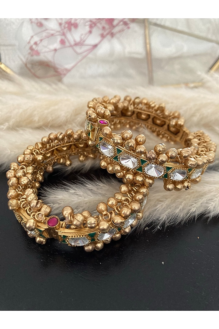 Gold Plated Kundan Polki & Green Stone Bangles (Set Of 2) by Autumn Poppy at Pernia's Pop Up Shop