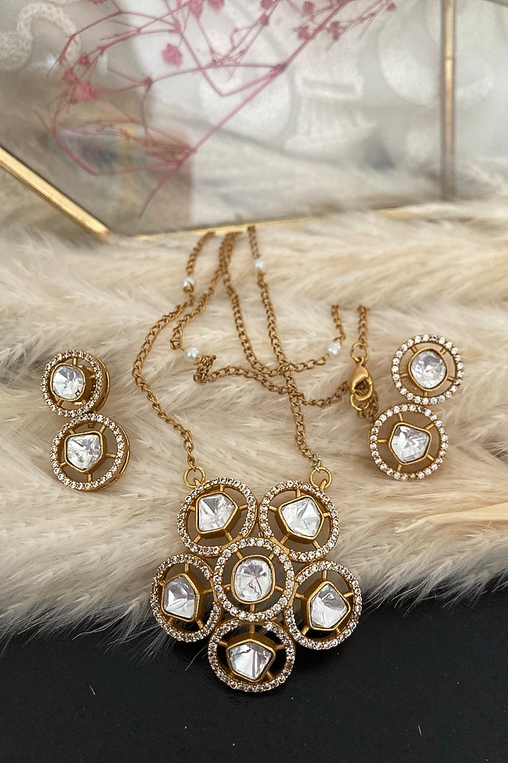 Gold Finish Uncut Polki Diamond Floral Pendant Necklace Set by Autumn Poppy at Pernia's Pop Up Shop