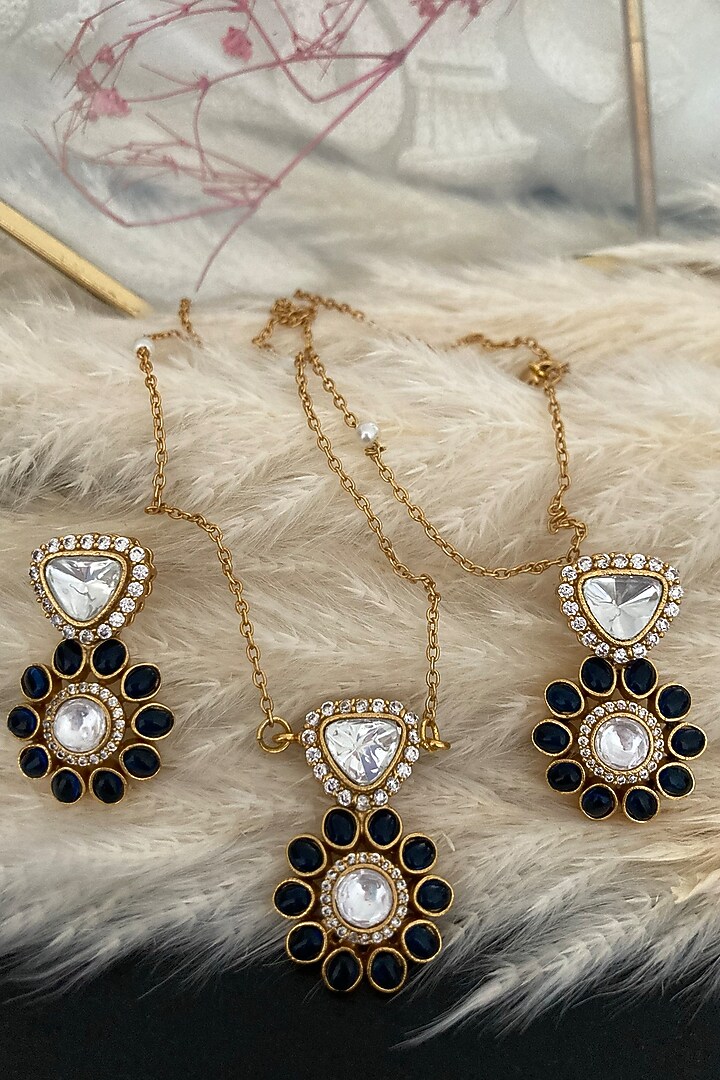 Gold Finish Uncut Polki Diamond & Black Onyx Floral Pendant Necklace Set by Autumn Poppy at Pernia's Pop Up Shop