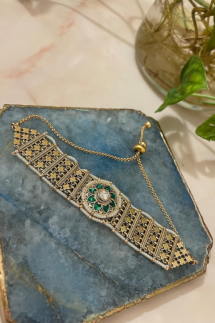 Gold Finish Kundan Polki & Emerald Stone Bracelet by Autumn Poppy