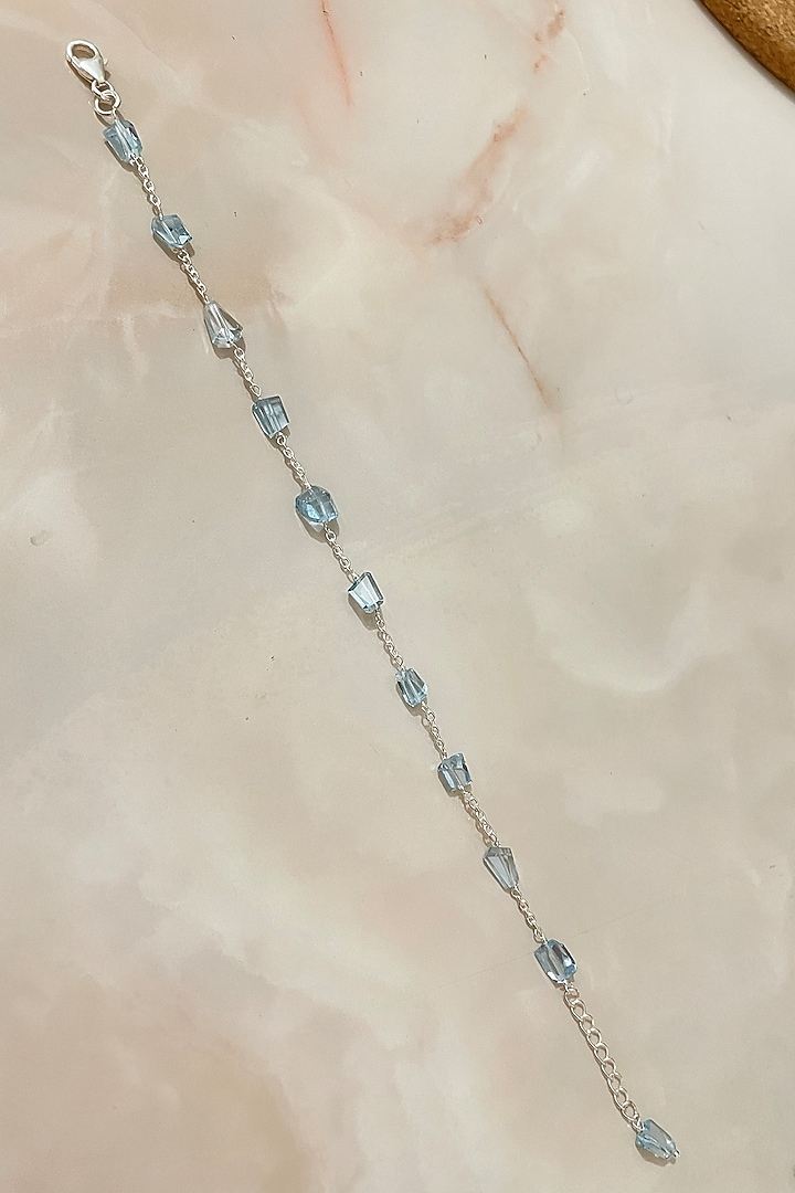 White Finish Blue Topaz Bracelet In Sterling Silver by Autumn Poppy at Pernia's Pop Up Shop