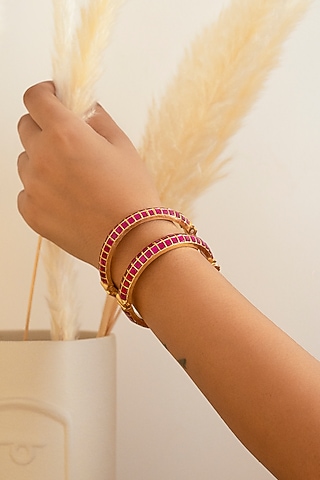 Gold Finish Kundan Polki & Ruby Stone Bangles (Set of 2) by Autumn Poppy