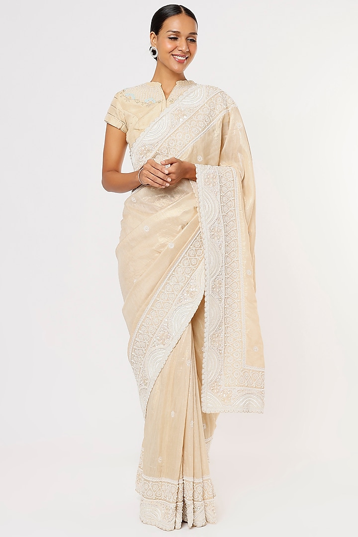 Beige Hand Embroidered Saree Set by Aura Kreations