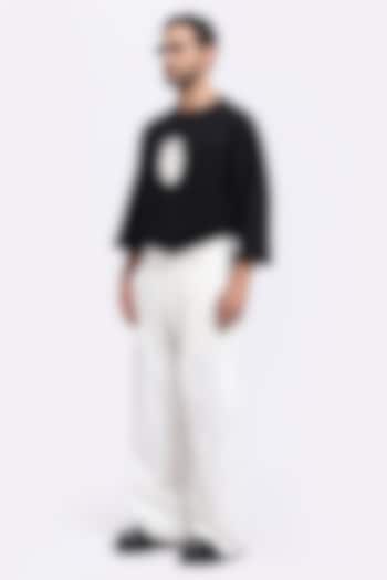 White Cotton Twill Hand Embroidered Pants by Aurge Studios at Pernia's Pop Up Shop