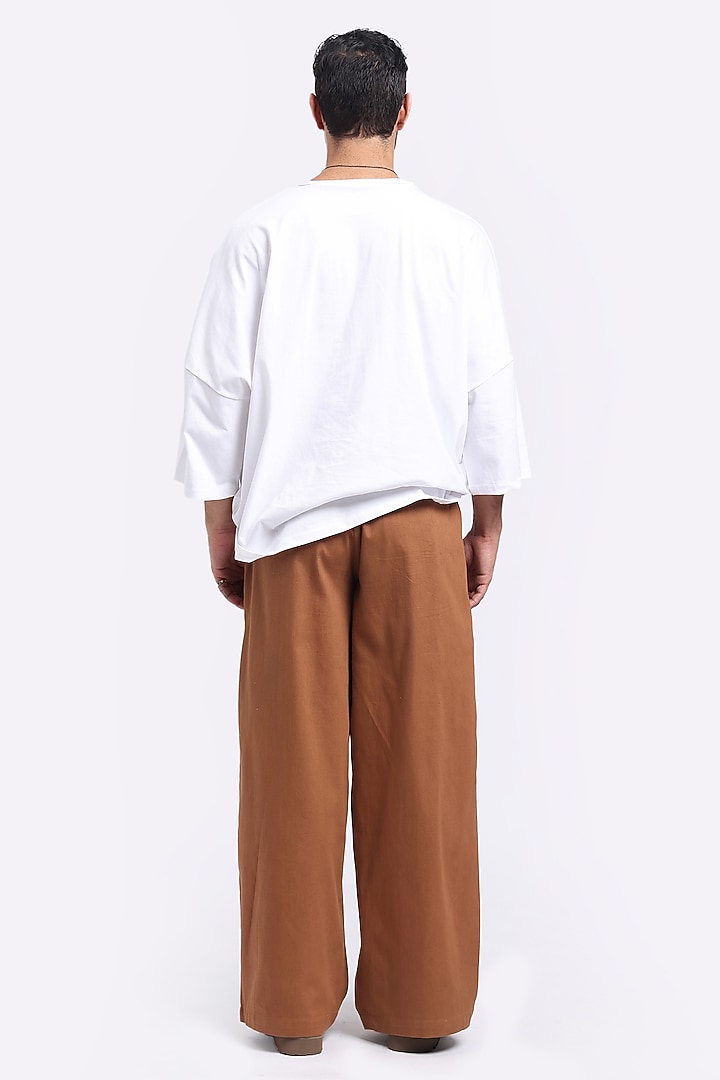 Caramel-Colored Tencel Twill Pants by Aurge Studios at Pernia's Pop Up Shop