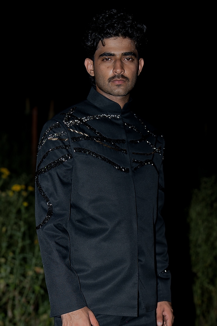Black Suiting Embroidered Wedding Bandhgala by Aurge Studios at Pernia's Pop Up Shop