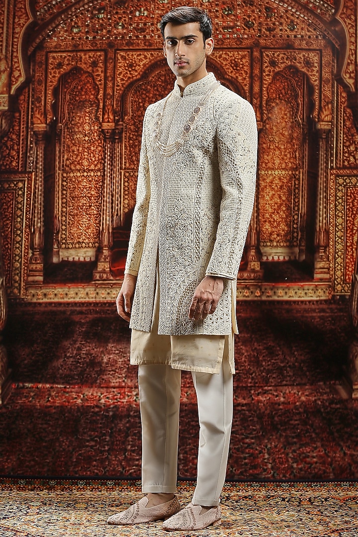 Ivory Raw Silk Resham Hand Embroidered Groom Sherwani Set by ASUKA at Pernia's Pop Up Shop