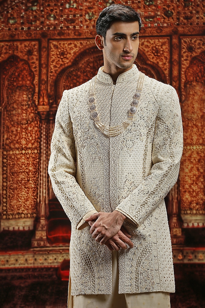 Ivory Raw Silk Resham Hand Embroidered Groom Sherwani Set by ASUKA at Pernia's Pop Up Shop