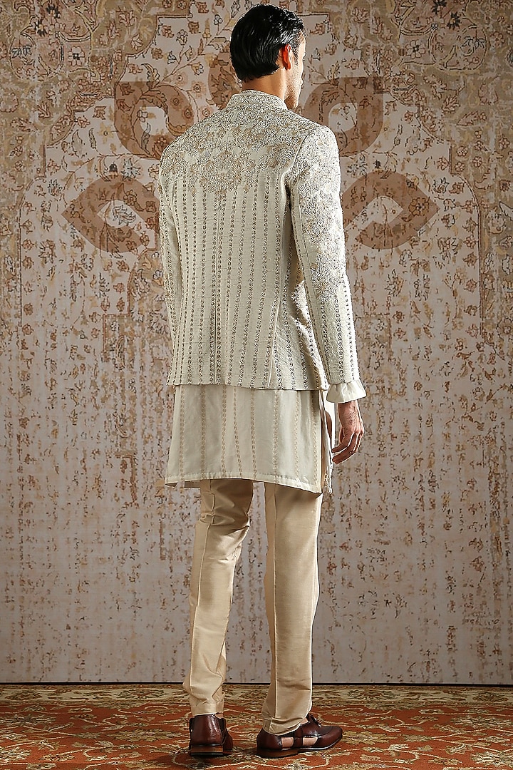 Ivory Raw Silk Embroidered Groom Bandhgala Set by ASUKA at Pernia's Pop Up Shop