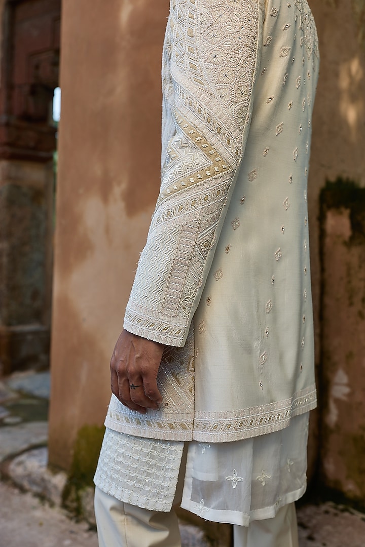 Cream Raw Silk Moti Embroidered Groom Indowestern Set by ASUKA at Pernia's Pop Up Shop