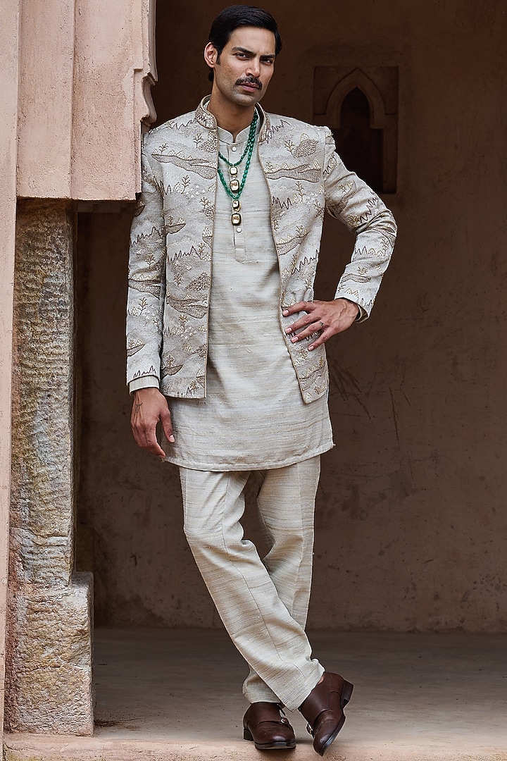 Beige Textured Suiting Hand Embellished Open Wedding Bandhgala Set by ASUKA at Pernia's Pop Up Shop