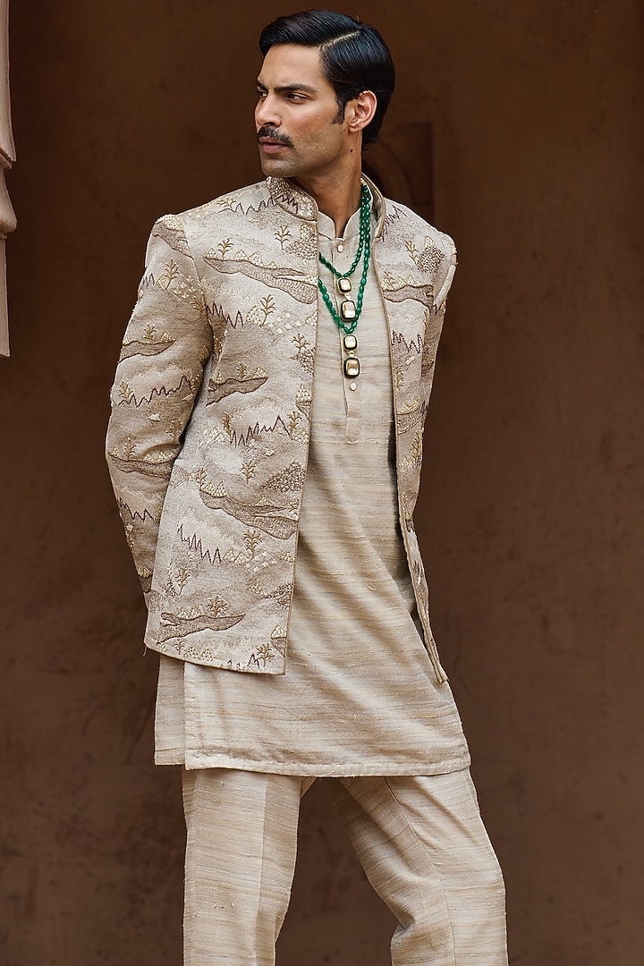 Beige Textured Suiting Hand Embellished Open Wedding Bandhgala Set by ASUKA at Pernia's Pop Up Shop