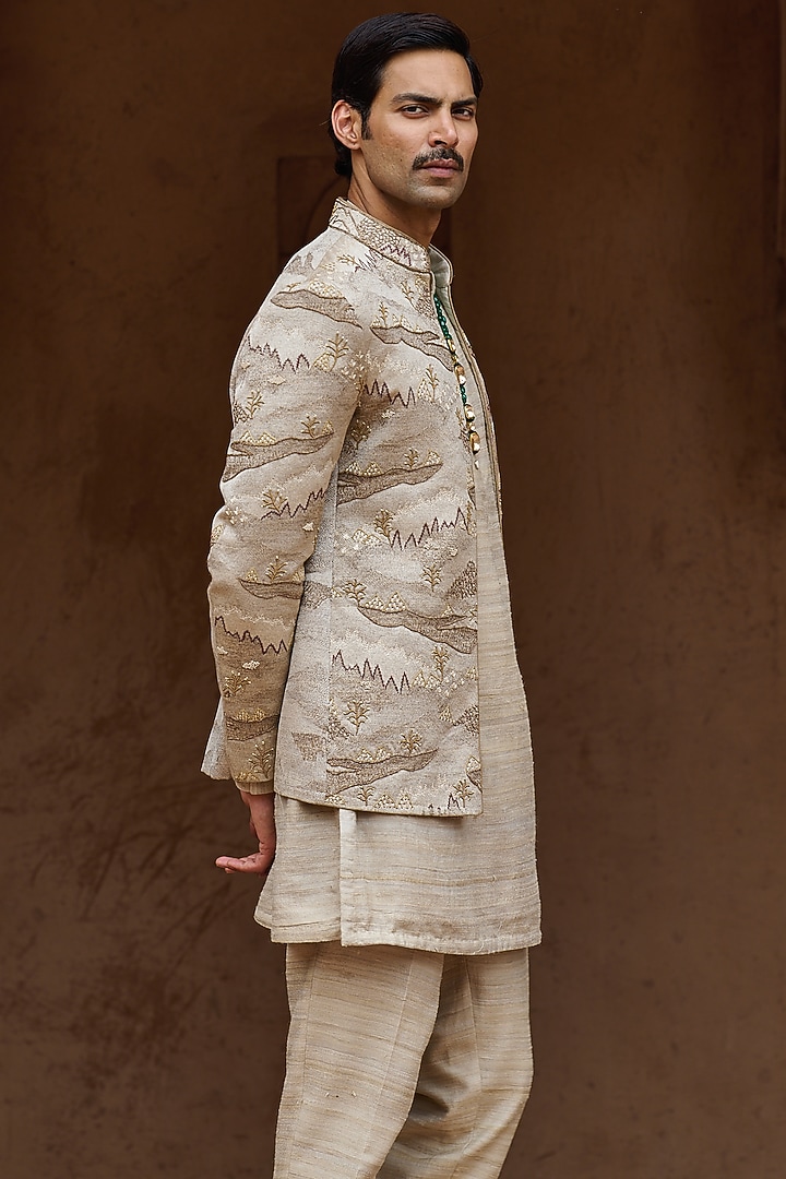 Beige Textured Suiting Hand Embellished Open Wedding Bandhgala Set by ASUKA at Pernia's Pop Up Shop