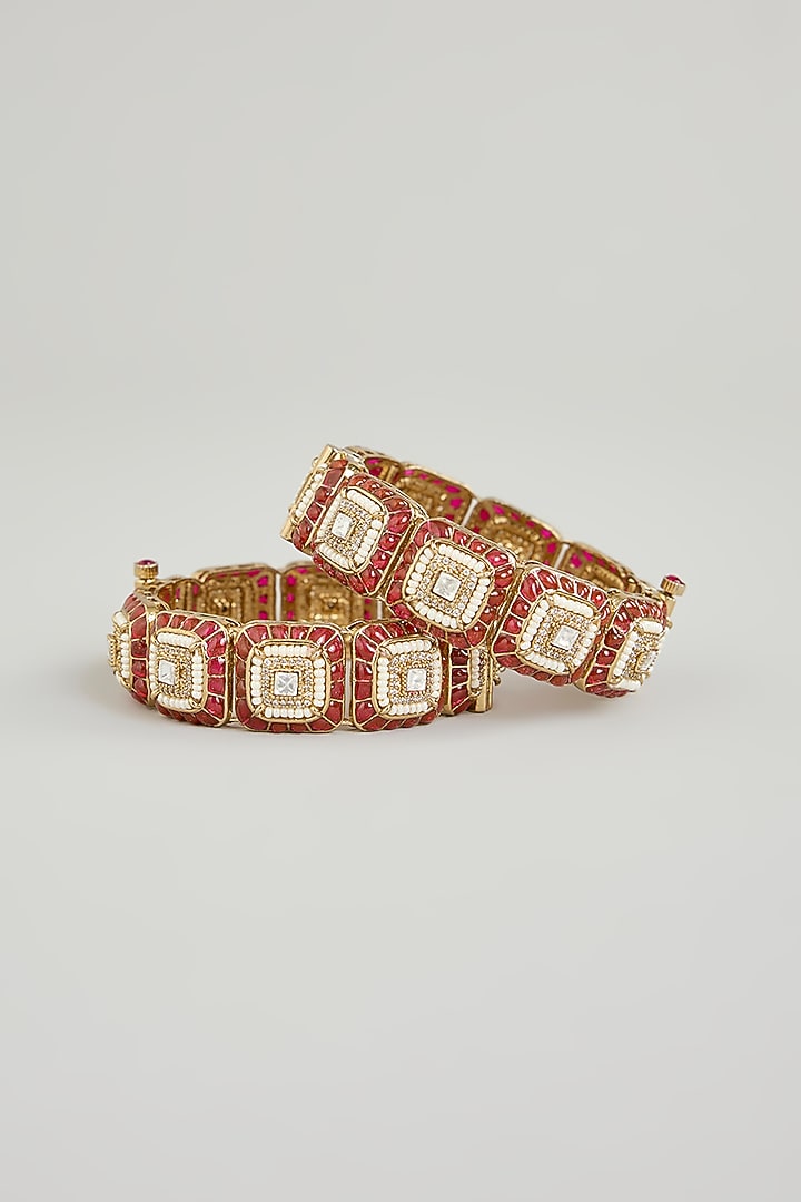Gold Finish Kundan Polki & Red Gemstone Bangles (Set Of 2) by Aura Trends at Pernia's Pop Up Shop