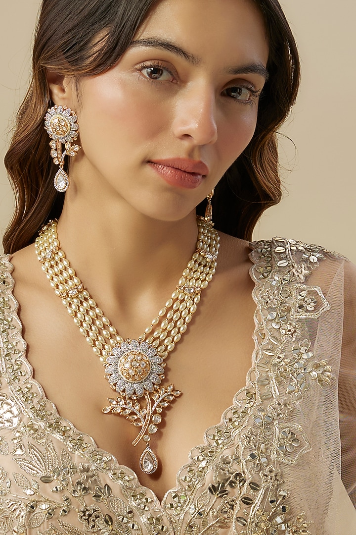 Gold Finish Floral Motif & Pearl Long Pendant Necklace Set by Aura Trends at Pernia's Pop Up Shop