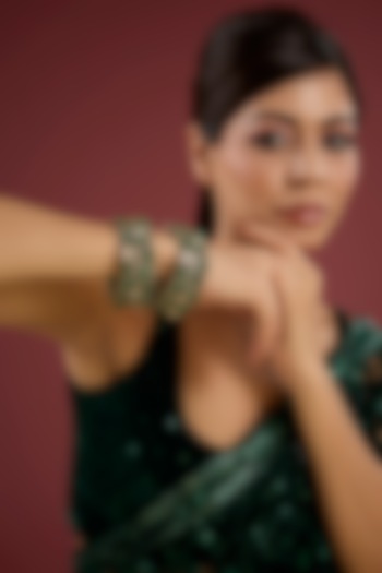 Gold Finish Kundan Polki & Emerald Stone Bangles (Set Of 2) by Auraa Trends at Pernia's Pop Up Shop