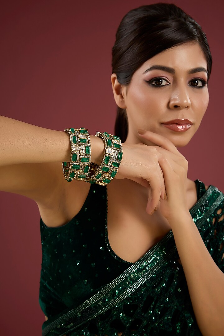 Gold Finish Kundan Polki & Emerald Stone Bangles (Set Of 2) by Auraa Trends at Pernia's Pop Up Shop