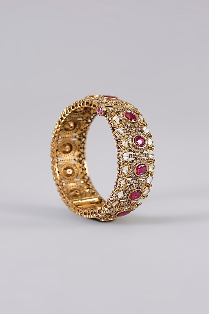 Gold Finish Kundan Polki & Ruby Stone Bangles (Set Of 2) by Aura Trends at Pernia's Pop Up Shop