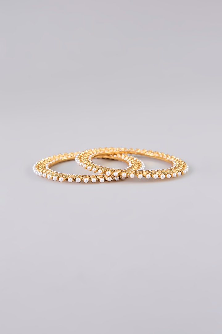 Gold Finish Pearl & Beaded Bangles (Set Of 2) by Auraa Trends at Pernia's Pop Up Shop