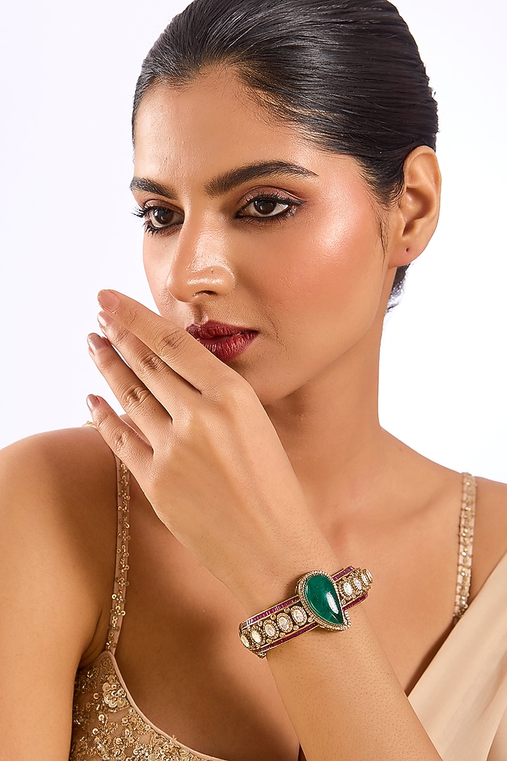 Gold Finish Kundan Polki & Emerald Drop Bracelet by Auraa Trends at Pernia's Pop Up Shop