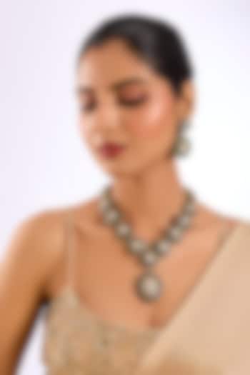 Gold Finish Kundan Polki Emerald-Edged Necklace Set by Auraa Trends at Pernia's Pop Up Shop