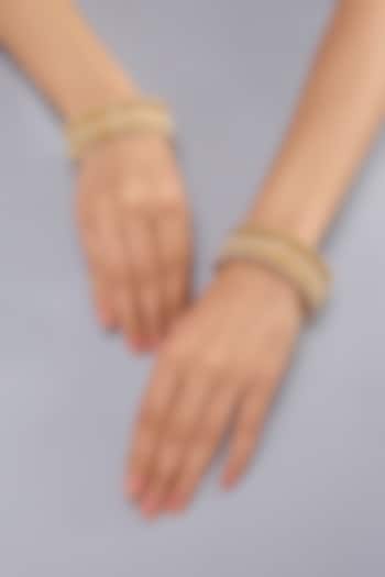 Gold Finish Kundan Polki Bangles (Set of 2) by Auraa Trends at Pernia's Pop Up Shop