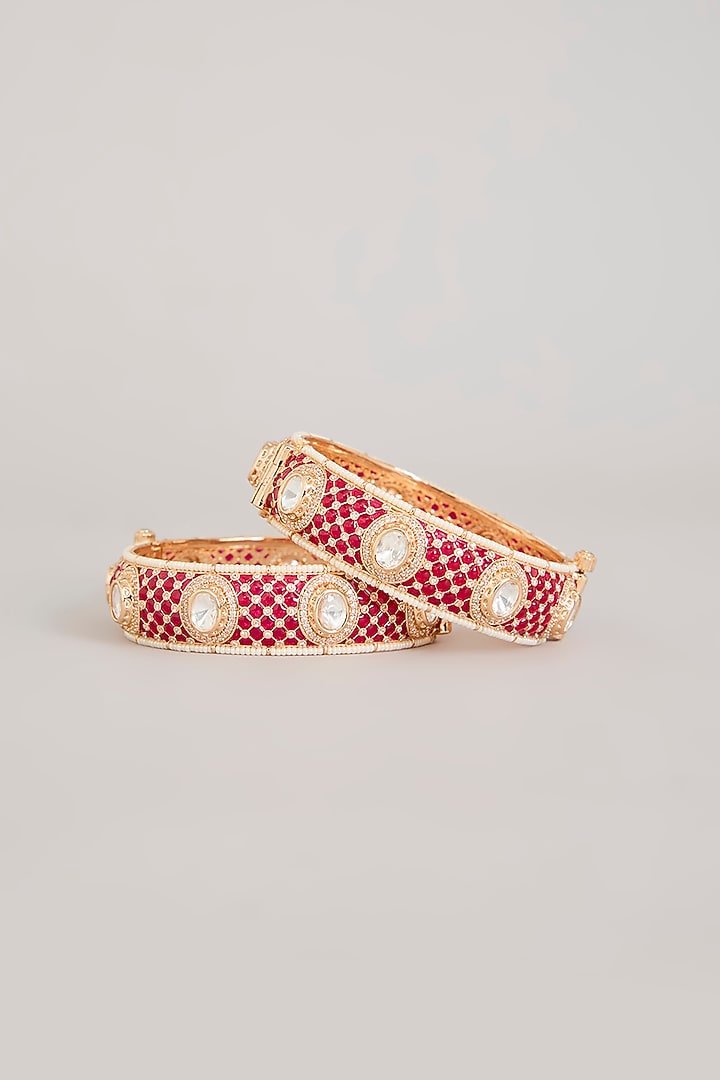 Gold Finish Kundan Polki & Ruby Pink Stone Bangles (Set Of 2) by Aura Trends at Pernia's Pop Up Shop