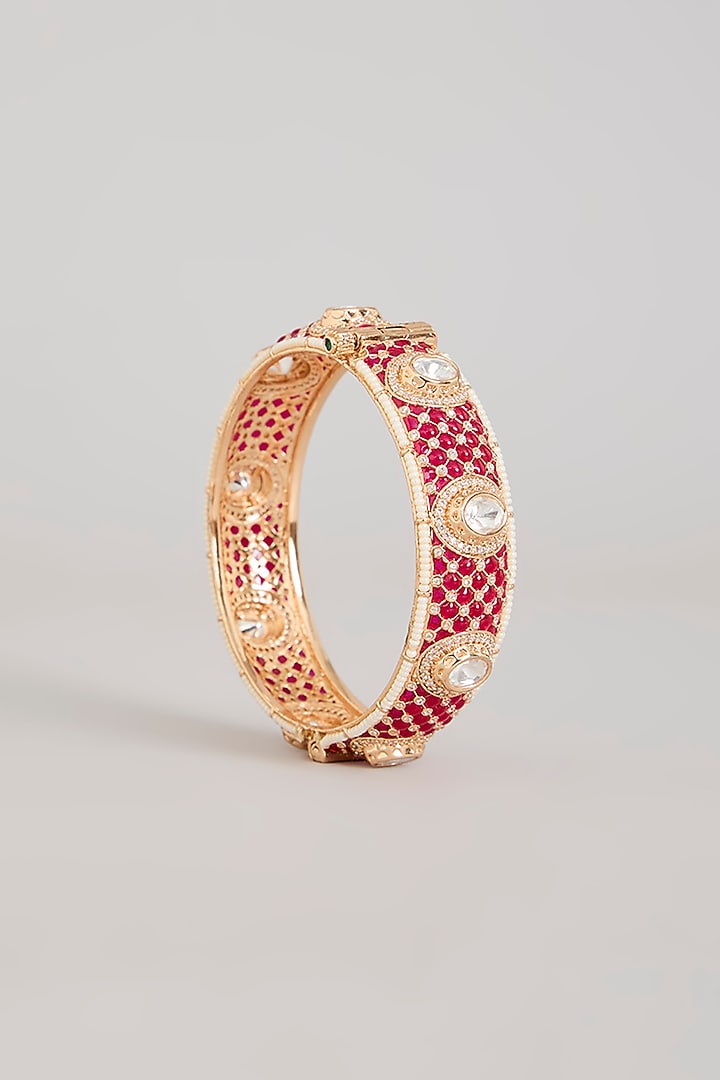 Gold Finish Kundan Polki & Ruby Pink Stone Bangles (Set Of 2) by Aura Trends at Pernia's Pop Up Shop