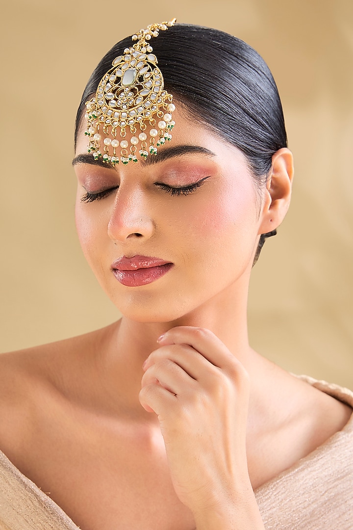 Gold Finish American Diamond & Emerald Green Maangtikka by Aura Trends at Pernia's Pop Up Shop