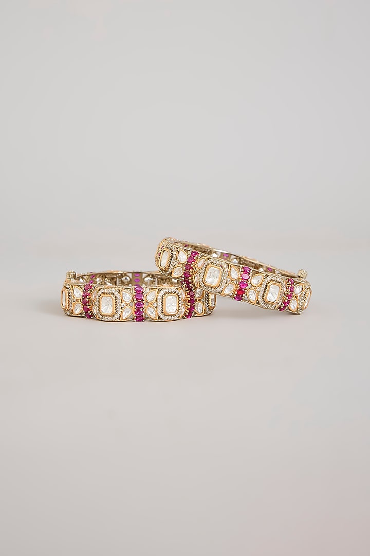 Antique Gold Finish Kundan Polki & Ruby Pink Stone Bangles (Set Of 2) by Aura Trends at Pernia's Pop Up Shop
