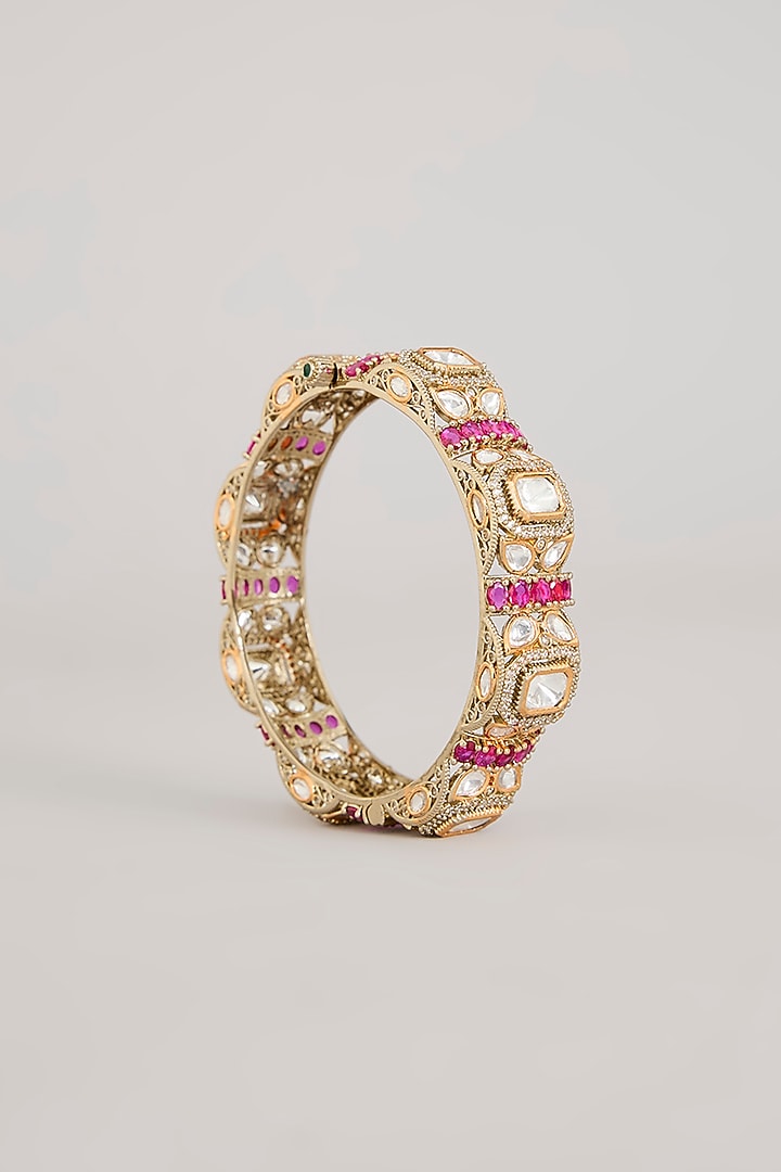 Antique Gold Finish Kundan Polki & Ruby Pink Stone Bangles (Set Of 2) by Aura Trends at Pernia's Pop Up Shop