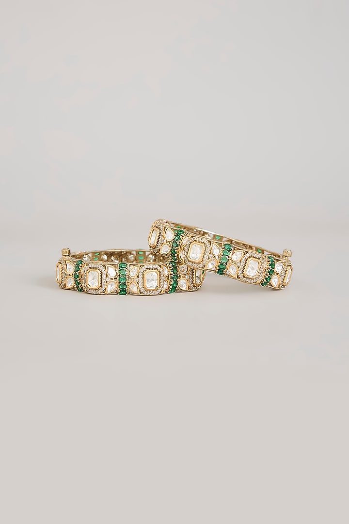 Gold Finish Kundan Polki & Emerald Green Stone Bangles (Set Of 2) by Aura Trends at Pernia's Pop Up Shop