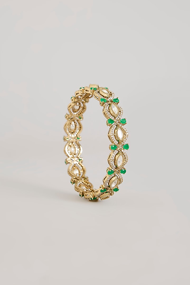 Gold Finish Kundan Polki & Emerald Green Stone Bangles (Set of 2) by Aura Trends at Pernia's Pop Up Shop